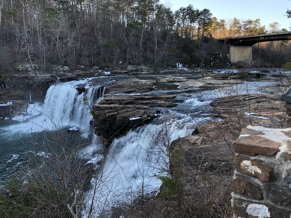 Little River Falls in winter with ice along the rocks